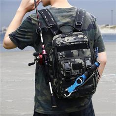 a man with a backpack and fishing rod