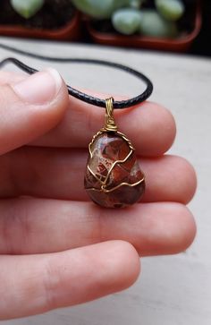 This is a breciated red jasper crystal necklace. Red jasper is said to be good for motivation and positivity. Each of my necklaces include a black cord with an adjustable clasp. Oc Concept, Red Jasper Crystal, Wrapped Necklace, Crystal Necklaces, Jasper Necklace, Necklace Red, Wire Wrapped Necklace, Red Jasper, Crystal Necklace