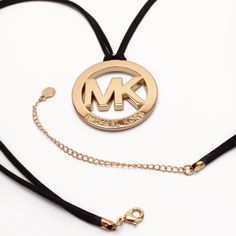 Michael Kors Pendant On 2 Strands Of Cruelty-Free Vegan Faux Suede Lace W/14k Gold Filled Lobster Clasp Closure & 4 In Extension Chain Ending W/ A Second Small Authentic Mk Charm Necklace Length= 32 In + 4 In Extension Chain Pendant Diameter= 2 In Colors Available= Black, Blue & Red This Is A Handmade Upcycled Item Created By Repurposing An Authentic Michael Kors Keychain & Sold By Jewelry My Style By Jms. Item Gift Wrapped In Packaging As Shown In Last Pics. Shop @Jewelrymystylebyjms On Ig & Fb Elegant Gold-tone Jewelry With Metal Logo, Elegant Gold Jewelry With Metal Logo, Luxury Jewelry With Metal Logo, Michael Kors Keychain, Michael Kors Necklace, Crystal Heart Necklace, Crystal Choker Necklace, Michael Kors Jewelry, Toggle Necklace