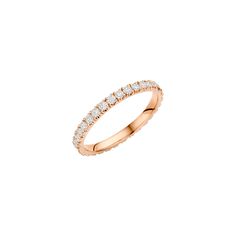 a rose gold wedding band with white diamonds