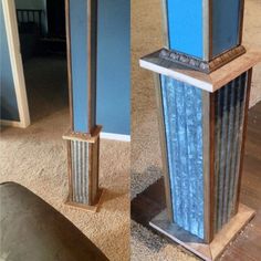 two tall blue and silver vases sitting on top of a wooden floor