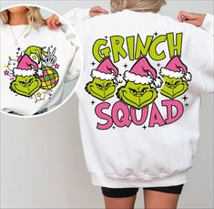 the grinch squad sweatshirt is being worn by a woman with her hands on her hips