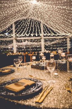 the table is set with place settings for dinner