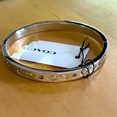 Coach Silver Class Bangle. Nwt, Never Worn. Cute Bangle Bracelets, Chic Coach Bangle Bracelet, Coach Silver Bangle Bracelet, Coach Silver Bangle Bracelets, Infinite Jewelry, Girl Wishlist, Material Gworl, Silver Aesthetic, Italian Bracelet