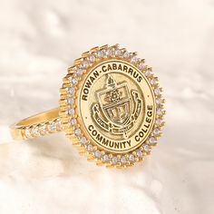 We creating this graduation college class ring you see using 925 sterling silver and 14k gold. It is the perfect accessory that will suit your shine or make it feel special. It will be a unique gift that will add meaning to your precious days such as graduations, birthdays, mother's days, wedding events. Diameter of the area to be customized: 12mm Click on this link for other signet rings: https://www.etsy.com/shop/daintypersonalizedco/?section_id=33650047 ♥ HOW TO ORDER ♥ Plase select your desi Personalized Gold Rings For Commemoration, Gold Signet Ring With Halo Setting For Gift, Gold Signet Ring With Halo Setting As A Gift, Gold Oval Halo Ring As Gift, Gold Cluster Ring With Halo Setting For Gift, Gift Cluster Ring With Halo In Open Design, Gold Halo Ring Gift, Gold Halo Ring For Gift, Gold Halo Ring As Gift