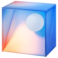 a blue cube with a white ball in the center and an orange circle at the top