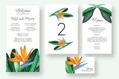 the tropical wedding stationery is set up with flowers and leaves, including two cards