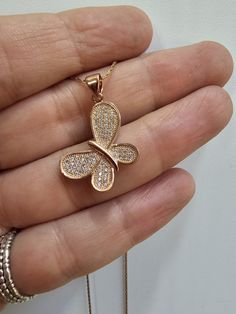 Beautiful dainty butterfly pendant gliding on a dainty 14K rose gold filled chain. This lovely animal jewelry is set with tiny sparkly brilliant clear zircon stones . Classic elegant occasion necklace that makes the perfect gift for her This lovely necklace makes a beautiful birthday or anniversary gift for her. ♥ DETAILS Necklace: 14K Rose Gold Filled Pendant Length: 1.78" X 0.67" inch (=20mm X 17mm) Pendant: Butterfly made of 2 microns thick rose gold cover plating set with tiny clear zircon stones Necklace Length: 16" + Extender ♥ Personalized it! Add an initial letter to the necklace clasp - https://www.etsy.com/listing/612297583 ♥ GIFT IT! Jewelry comes in a cute little box ready for gifting! I can ship to a third party if you wish your item to be a gift. Please let me know and I will Sparkly Butterfly, Pendant Butterfly, Gold Butterfly Necklace, Dainty Butterfly, Rose Gold Butterfly, Butterfly Necklace Gold, Necklace Clasp, Stones Necklace, Detailed Necklace