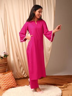 This Magenta Kurta with Trousers is designed with a solid, straight shape and regular style for a timeless look. The round neck, three-quarter flared sleeves and calf length hem add elegance, while the silk blend machine weave fabric ensures comfort. The solid trousers with partially elasticated waistband and slip-on c Elegant Kurta With 3/4 Sleeve For Eid, Elegant 3/4 Sleeve Kurta For Eid, Elegant Summer Sets With 3/4 Sleeve, Elegant Summer Kurta With Set-in Sleeves, Elegant Festive Set With 3/4 Sleeve, Elegant Festive Sets With 3/4 Sleeve, Elegant Holiday Set With 3/4 Sleeves, Western Kurtis, Weave Fabric