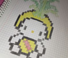 the pixel art is made with colored pencils and crayon paper to make it look like an old video game character