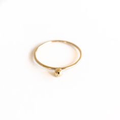 A dainty, but sturdy Single Dot Gold Ring to be worn often and treasured. • Smooth finish • Made-to-order, please allow 3-5 business days for preparation Material: 14k Gold Filled Dainty Everyday Rings Stamped 14k, Everyday 14k Gold Midi Rings, Dainty Yellow Gold Midi Rings Stamped 14k, Everyday Midi Rings In 14k Gold, Everyday Tiny 14k Gold Rings, Simple 14k Gold Midi Rings, Everyday Dainty 14k Stamped Rings, Dainty Stackable Rings In Recycled Gold Stamped 14k, Simple Hammered 14k Gold Rings