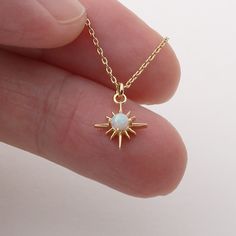 Material : Brass, Cubic, Opal (synthetic stone) Pendant : 9mm x 12mm Opal : 3mm Celestial Star-shaped Gemstone Necklace, Star-shaped Opal Jewelry Gift, Gold Opal Necklace, North Star Necklace, Starburst Necklace, Necklace Opal, Celestial Necklace, Necklace Dainty, Opal Necklace