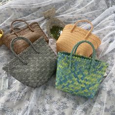 This Basket Rattan Woven Bag Handbag is handcrafted using traditional techniques for a high-quality and durable design. Made from 100% natural rattan, this bag is eco-friendly and biodegradable. The timeless design is perfect for adding a touch of bohemian charm to any outfit, while the sturdy construction ensures it can hold all your essentials. Handcrafted from natural rattan, our Basket Rattan Woven Bag Handbag is a timeless accessory. This eco-friendly bag is both durable and stylish, with intricate woven details. Perfect for everyday use or a day at the beach, this bag is a must-have for any fashion-forward and environmentally-conscious individual. Shopping Bag Storage, Classic Scarf, Basket Tote, Woven Handbags, Bucket Bags, Eco Friendly Bags, Travel Shopping, Handbags Casual, Woman Weaving