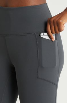 These performance leggings feature a high waist for smoothing coverage and two side patch pockets to keep your essentials secure through your activities. Pull-on style Front patch pockets UPF 50+ sun protection 80% nylon, 20% polyester Machine wash, line dry Imported Gray Sporty Activewear With Side Pockets, Athleisure Activewear With Mesh Pockets, Stretch Activewear With Side Pockets For Outdoor, Solid Color Activewear With Side Pockets For Outdoor, Gray Activewear For Gym With Side Pockets, Gray Activewear With Side Pockets For Gym, Sporty Compression Yoga Pants With Hip Pockets, Outdoor Solid Activewear With Side Pockets, Outdoor Athleisure Activewear With Hip Pockets