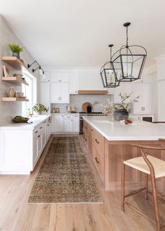 the kitchen is clean and ready to be used for cooking or dining, but it's not too far from the living room