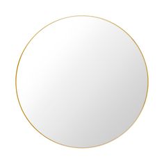 a round mirror with a gold rim on a white background