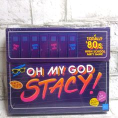 a purple game machine that says oh my god stacy