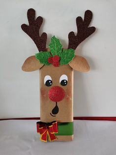 a paper bag with a reindeer's head on it