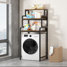 a washer sitting in front of a window next to a shelf filled with items