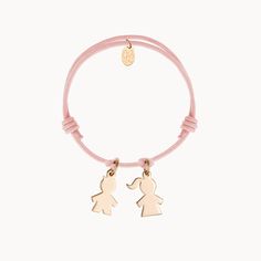 We are family. Cherish the unbreakable bonds of love with our Personalized Mini Family Bracelet. A meaningful personalized gift for a growing family, each mini girl &amp; boy charm perfectly represents your loved ones and little ones, ready to hand-engrave with treasured names and dates.18K Champagne Gold Plated, 925 Sterling Silver or 18K Rose Gold PlatedCharms measure: 0.5 x 0.3 (Mini Girl, Mini Boy)Braid made of a durable, colorfast polyesterFully adjustable sliding knot fasteningHand-engraved in our Paris workshopSent with love in a complimentary gift boxAny slight variations in lettering depth, spacing and alignment from the examples shown are part of the aesthetic and originality of the piece Adjustable Nickel-free Charms For Friendship, Adjustable Bracelets With Removable Charms For Friendship, Rose Gold Hypoallergenic Charm Bracelet For Friendship, Adjustable Pink Friendship Charms, Rose Gold Friendship Bracelets With Charms, Adjustable Engraved Rose Gold Charm Bracelet, Engraved Rose Gold Adjustable Charm Bracelet, Personalized Adjustable Name Bracelet With Charms, Personalized Adjustable Charms As Personalized Gifts