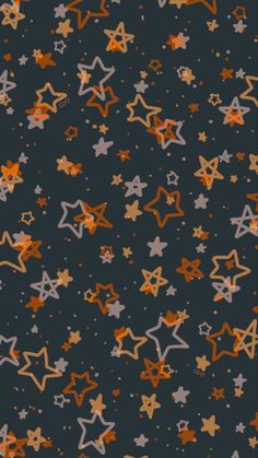 an orange and grey star pattern on a black background