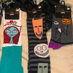 Four Nightmare Before Christmas Socks. 4 Total. Brand New With Tags. 25 Years Edition Shoe Size Unisex Size 4-10 Jack Skellington And Sally And The Three Musketeers Blue And Grey And Black Machine Washable Knee High And Calf High. Can Sell Separately. Jack Y Sally, Disney Clothing, Trendy Socks, Halloween Socks, Gaming Merch, Jack And Sally, The Nightmare Before Christmas, Novelty Socks, Happy Socks