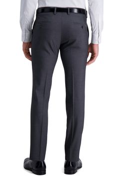 A slim fitting pair of dress pants are accented with a herringbone print for refined style. 11" rise, 30" inseam (size 30 x 30) Zip fly with hook-and-bar closure Side pockets Back welt pockets 64% polyester, 34% viscose, 2% elastane Dry clean Imported Model stats: 6'1" height, 32" waist. Model is wearing size 30 x 30. Elegant Formal Bottoms With Herringbone Pattern, Formal Fitted Bottoms With Herringbone Pattern, Elegant Fitted Bottoms With Herringbone Pattern, Fitted Herringbone Pants For Workwear, Fitted Herringbone Workwear Bottoms, Fitted Herringbone Pattern Bottoms For Workwear, Fitted Herringbone Pattern Bottoms For Work, Tailored Herringbone Pattern Pants For Business Casual, Slim Fit Dress Pants