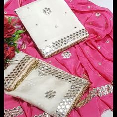 Unstitched Suit Upada Silk White And Pink Gotta Patti Work White Unstitched Wedding Suit With Gota Work, White Handwork Salwar Kameez For Eid, White Unstitched Suit With Mirror Work For Wedding, White Unstitched Wedding Suit With Mirror Work, White Semi-stitched Unstitched Suit With Gota Work, Festive White Unstitched Suit With Mirror Work, White Semi-stitched Sets With Handwork, Elegant White Handcrafted Sets, White Traditional Unstitched Suit With Mirror Work