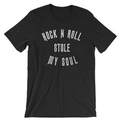 "Rock n Roll Stole My Soul shirt - Awesome gift for rocker - Distressed print style for old school rockers - Short-Sleeve Unisex T-Shirt This t-shirt is everything you've dreamed of and more. It feels soft and lightweight, with the right amount of stretch. It's comfortable and flattering for both men and women. * 100% combed and ring-spun cotton (heather colors contain polyester) * Fabric weight: 4.2 oz (142 g/m2) * Shoulder-to-shoulder taping * Side-seamed The Male model is wearing a size M. He Rocker Short Sleeve T-shirt For Streetwear, Unisex Rock And Roll T-shirt For Streetwear, Unisex Rocker T-shirt For Concerts, Rock And Roll T-shirt With Text Print, Rock And Roll Crew Neck T-shirt With Screen Print, Rock And Roll Screen Print Crew Neck T-shirt, Rock Style Crew Neck T-shirt With Screen Print, Rock And Roll Short Sleeve Letter Print T-shirt, Rock Style Band Logo T-shirt With Crew Neck