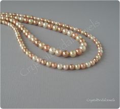 CB163: Swarovski Pearls multicolor necklace is available in 16 inches (40.5cm), 18 inches (45.5cm) and 20 inches (51cm) long and it has an extension of about 2 inches (5cm) long. Please select the length for necklace that you need. The necklace is available with 6mm pearls and 8mm pearls. Also you can purchase two necklaces 6mm and 8mm together. Please select the pearl size before check out. Materials and sizes: The Swarovski pearls are made in Austria. Necklace pearl size: 6mm and 8mm Pearl col Rose Gold Pearl Necklace With Round Beads, Peach Necklace, Swarovski Pearl Necklace, Multicolor Necklace, Gold Pearl Bracelet, Two Necklaces, Rose Gold Pearl, Bracelet Rose Gold, Bridesmaid Gifts Jewelry