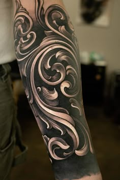 a person with a tattoo on their arm