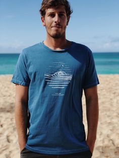 Men's Night Surf tee by The Shallow Reef Studio with an original hand drawn design. Hand printed on a super soft organic cotton tee on the North Shore of Oahu, Hawaii with non-toxic, water based ink. Dyed by hand with natural indigo dye. PRODUCT DETAILS 100% Organic Pima Cotton Alternative Apparel tee Indigo dyed by hand- may have slight color variations Socially responsible manufacturing Super soft, high quality and comfortable Designed, dyed, and printed by Moona Whyte note: this item is made Surfing Graphic Tee With Screen Print, Graphic Surfing T-shirt With Screen Print, Graphic Tee With Screen Print For Surfing, Cotton Surfing T-shirt With Screen Print, Blue Surfing Tops With Screen Print, Cotton Screen Print T-shirt For Surfing, Cotton T-shirt With Screen Print For Surfing, Surfing Graphic Tee With Back Print, Graphic Tee With Back Print For Surfing