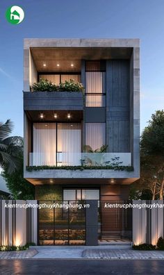 an apartment building with plants growing on the balconies and windows above it is lit up at night