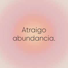 the words atriago abundancia are in black and white on a pink background