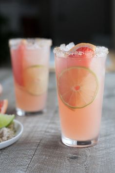 two glasses filled with watermelon and lime margaritas