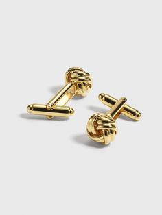 Go for gold. If you're looking for a subtle way to add a little flash to your look, these cufflinks with a refined knot design are a clear winner. Polished brass Bullet back closure Men Brooch, Knot Cufflinks, Tuxedo Styles, Suit Prom, Men's Brooch, Black Tux, Going For Gold, Wedding Plan, Gold Cufflinks