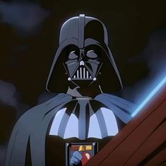 darth vader is looking at his cell phone in star wars the animated series