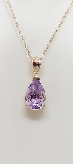 "Drop 9x5mm AMETHYST 14k Yellow Gold Pendant / Necklace. 3.18ct Natural stone. 18\" gold Chain necklace. Tear Drop Gemstone Jewelry. Amethyst. February Birthday Stone. Astrology. Gift for her. Zodiac. Product Info: - Stone: Drop Amethyst. - Color: Purple. - Pendant Measures: 15mm x 5mm. - Stone Measures: 9x5mm - Stone Carat: 3.18ct - Metal: 14k Yellow Gold. - Chain Length: 18 inches Rope Chain. - Made in USA. - Nice Gift Box Included." Purple Jewelry Necklace, Amethyst Jewelry Necklace, Amethyst Earrings Gold, Purple Stone Necklace, Purple Pendant, Birthday Stone, Pretty Jewelry Necklaces, Gift Sets For Her, February Birthday