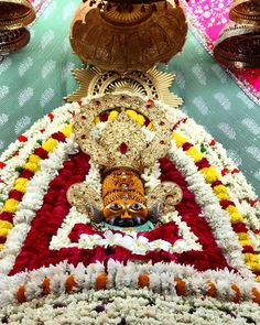 an elaborately decorated display with candles and decorations