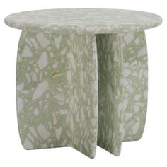 two tables made out of marble with white and green designs