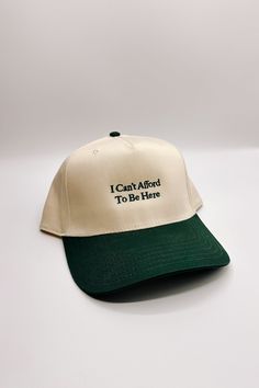 Image shows front view of the I Can't Afford To Be Here Trucker Hat against a white background. Dark Green Embroidery, Green Embroidery, Faux Leather Purse, Studded Necklace, Everyday Adventures, Travel Dress, Faux Leather Belts, Jumpsuit Shorts Rompers, Bar Earrings