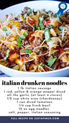 a bowl filled with pasta and meat on top of a table