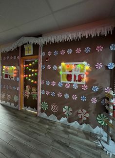 an indoor candy shop decorated for christmas