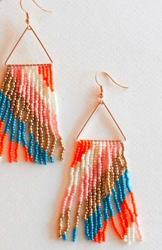 The Macy Multicolor Fringe Beaded Drop Dangle Earrings boast a lively array of vibrant hues and playful fringe detailing, adding a burst of joy and personality to any ensemble. Multicolor Beaded Fringe Earrings For Party, Summer Orange Beaded Tassel Earrings, Trendy Multicolor Beaded Earrings With Tiny Beads, Trendy Multicolor Beaded Dangle Earrings, Multicolor Fringe Beaded Earrings With Round Beads, Multicolor Fringe Beaded Earrings For Beach, Multicolor Dangle Tassel Earrings With Beads, Multicolor Beaded Tassel Earrings For Summer, Multicolor Beaded Tassel Earrings For Party