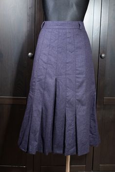 Vintage Dark Blue New Wool Pleated Skirt | Accordion Pleated Skirt | EU 40 skirt The skirt is in a good condition. MEASUREMENT (taken flat) Waist: 80 cm (doubled) Length: 74 cm Weight: 525 g MATERIAL: 100% new wool, lining: 100% acetate BRAND: Lady H/hammer  In case of any questions, please, contact me. Double Pleated Skirt, Fitted Winter Bottoms With Pleated Hem, Winter Blue Pleated Skirt, Fitted Full Skirt With Pleated Hem, Fitted Blue Skirt With Pleated Hem, Purple Relaxed Skirt For Workwear, Purple Relaxed Skirt For Work, Fitted Purple Pleated Lined Skirt, 40 Rocks