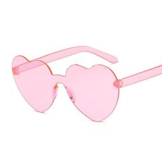 Limited Stock Available - Click "ADD TO CART" To Get Yours Now Pick up a pair of Love Heart Sunglasses For Women Fashionable Cute Sunglasses from Arimonz. Fashionable, cute sunglasses made for women. These stylish designer sunglasses are made with 100% quality materials. The lenses are UV400 protection, anti-Scratch, polycarbonate, and will stay looking new for a long time.  Specifications: Style: Rimless Lenses Optical Attribute: Mirror Lenses Optical Attribute: Anti-reflective Lenses Optical A Sunglasses For Your Face Shape, Heart Shaped Glasses, Sunglasses Pink, Heart Glasses, Heart Shaped Frame, Plastic Glasses, Cute Sunglasses, Rimless Frames, Sunglasses Women Fashion