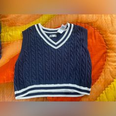 Nwt Navy Blue/White Hollister Sweater Vest Size L. Never Been Worn New With Tags White Preppy Knit Tops, White Knit Preppy Tops, Preppy Navy Tops For Spring, Preppy Navy Top For Spring, Preppy Navy Spring Top, Navy Cotton Casual Sweater Vest, Casual Navy Cotton Sweater Vest, Blue Cotton Sweater Vest For Fall, Preppy Blue V-neck Top