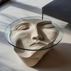 a glass table with a face on it