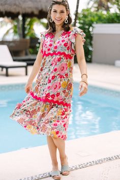 We honestly can't think of a more perfect spring/summer dress! That floral print and those hues are stunning together and we love that rickrack detailing. Rickrack is so trendy right now!  V-neckline Ruffled sleeves Floral print Rickrack... Multicolor V-neck Floral Dress With Vibrant Print, Spring Floral V-neck Dress With Vibrant Print, Pink Floral Print V-neck Dress For Summer, Multicolor Floral V-neck Dress With Vibrant Print, Spring Floral Print V-neck Dress For Vacation, Summer Multicolor Floral V-neck Dress, Multicolor Floral V-neck Dress For Summer, Multicolor V-neck Floral Dress For Summer, V-neck Midi Dress With Lace Trim For Garden Party