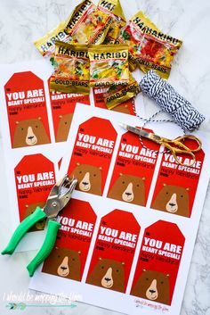 printable valentine's day cards with scissors and candy bar wrappers on top